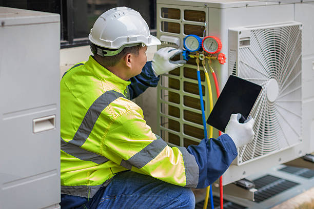 Professional Hvac technician working in Ogilvie, MN